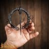Twisted Darkened Steel Fibula with Knotwork Ends